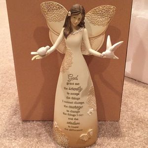 9 inch Serenity Angel holding doves. New in box.